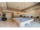 A game room featuring two billiard tables, stylish lighting fixtures, and comfortable seating, perfect for recreation and entertainment at 1540 Gulf Blvd # 1705, Clearwater, FL 33767