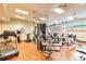 Fully equipped gym with a variety of machines, free weights, and mirrored walls at 1540 Gulf Blvd # 1705, Clearwater, FL 33767