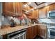 Close up on modern kitchen with stainless steel appliances and granite countertops at 1540 Gulf Blvd # 1705, Clearwater, FL 33767