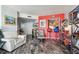 Comfortable living room with tiled floors, open to front entry and kitchen at 1540 Gulf Blvd # 1705, Clearwater, FL 33767