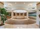 A grand lobby featuring elegant columns, tiled flooring, and a scenic mural creating an inviting and luxurious entrance at 1540 Gulf Blvd # 1705, Clearwater, FL 33767
