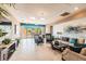 A spacious lounge featuring modern furnishings, elegant decor, and direct access to an outdoor area at 1540 Gulf Blvd # 1705, Clearwater, FL 33767