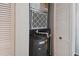 Storage closet with hot water tank and HVAC air handler at 1540 Gulf Blvd # 1705, Clearwater, FL 33767