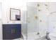 Modern bathroom with a large walk-in shower and marble at 1613 Druid E Rd, Clearwater, FL 33756