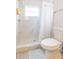 Updated bathroom with marble shower and tile flooring at 1613 Druid E Rd, Clearwater, FL 33756