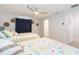 Bright bedroom with two twin beds and beach-themed bedding at 1613 Druid E Rd, Clearwater, FL 33756