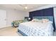 Spacious bedroom with twin and king-size beds, ceiling fan at 1613 Druid E Rd, Clearwater, FL 33756