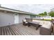 Relaxing deck with seating area, perfect for outdoor entertaining at 1613 Druid E Rd, Clearwater, FL 33756