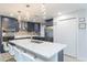 Modern kitchen with stainless steel appliances and quartz countertops at 1613 Druid E Rd, Clearwater, FL 33756