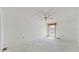 Bright bedroom with large window and ceiling fan at 1655 S Highland Ave # D238, Clearwater, FL 33756