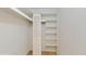 White closet with built-in shelves at 1655 S Highland Ave # D238, Clearwater, FL 33756