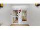 White entryway with two doors leading into the condo at 1655 S Highland Ave # D238, Clearwater, FL 33756