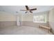 Under Construction: Room with ceiling fan, window, and concrete floors at 1671 Cape Ann Ne Ave # 1, St Petersburg, FL 33702