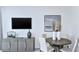 Small dining area with round table and four chairs at 2073 Hallier Cv, Wesley Chapel, FL 33543