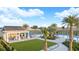 Resort-style pool with a large cabana and plenty of lounge chairs at 2073 Hallier Cv, Wesley Chapel, FL 33543