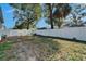 Backyard with a grassy area and privacy fence at 3005 E Shadowlawn Ave, Tampa, FL 33610