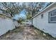 Backyard view of house and fence at 3005 E Shadowlawn Ave, Tampa, FL 33610