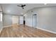Bright bedroom featuring wood floors and multiple entry points at 3005 E Shadowlawn Ave, Tampa, FL 33610
