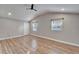 Spacious bedroom with hardwood floors and backyard access at 3005 E Shadowlawn Ave, Tampa, FL 33610