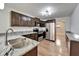 Modern kitchen with granite countertops and stainless steel appliances at 3005 E Shadowlawn Ave, Tampa, FL 33610