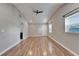 Light-filled living room showcasing wood floors and high ceilings at 3005 E Shadowlawn Ave, Tampa, FL 33610