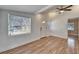 Living room with wood floors and front door view at 3005 E Shadowlawn Ave, Tampa, FL 33610