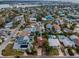Aerial view of a house with a nearby pool at 311 15Th Ave, Indian Rocks Beach, FL 33785