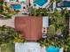 Top-down view of house with brown roof and pool at 311 15Th Ave, Indian Rocks Beach, FL 33785