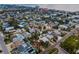 Aerial view of a house and neighborhood near the coast at 311 15Th Ave, Indian Rocks Beach, FL 33785