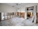 A bedroom in the midst of renovations, showing exposed framing and flooring at 311 15Th Ave, Indian Rocks Beach, FL 33785