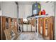 Unfinished hallway with water heater and plumbing exposed at 311 15Th Ave, Indian Rocks Beach, FL 33785