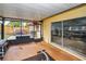 Screened porch with partial view of backyard at 311 15Th Ave, Indian Rocks Beach, FL 33785
