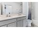 Bathroom with double vanity and shower/tub combo at 33166 Osprey Peak Way, San Antonio, FL 33576
