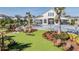Community pool and outdoor amenity area with water features, seating and landscaping at 3888 Almond Brook Blvd, Land O Lakes, FL 34638