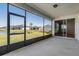 Spacious screened porch offers beautiful backyard and serene pond views at 3888 Almond Brook Blvd, Land O Lakes, FL 34638