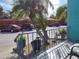 View from the porch shows well-maintained landscaping and off-street parking at 4140 55Th N St # 1115, Kenneth City, FL 33709
