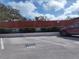 Well-maintained parking area with designated spots and clear markings in a condominium complex at 4140 55Th N St # 1115, Kenneth City, FL 33709