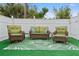 Comfortable wicker seating area on artificial turf at 5152 Victoria Ln, Holiday, FL 34690