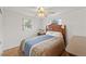 Bedroom with full-size bed and wood dresser at 5152 Victoria Ln, Holiday, FL 34690
