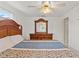 Bedroom with queen-size bed and wood dresser at 5152 Victoria Ln, Holiday, FL 34690