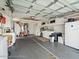Spacious garage with laundry area and ample storage at 5152 Victoria Ln, Holiday, FL 34690