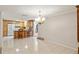 Kitchen features granite counters, wood cabinets, and breakfast bar at 5152 Victoria Ln, Holiday, FL 34690