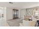 Spacious living room with tiled floors, neutral walls, and vintage furniture at 5152 Victoria Ln, Holiday, FL 34690
