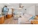 L-shaped sectional sofa and built-in storage in living room at 5152 Victoria Ln, Holiday, FL 34690
