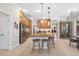 Charming kitchen boasts wooden cabinets, stainless steel appliances, and a breakfast bar at 5501 E Longboat Blvd, Tampa, FL 33615