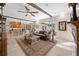Spacious living room with wood beams, tile floors, and great natural light at 5501 E Longboat Blvd, Tampa, FL 33615