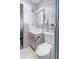 Bathroom with a classic vanity, mirrored cabinet, and easy access to the shower and bedroom at 5603 80Th N St # 512, St Petersburg, FL 33709