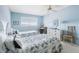 This bedroom features twin beds, a dresser and window with a view at 5603 80Th N St # 512, St Petersburg, FL 33709