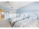 This bedroom features twin beds and a closet at 5603 80Th N St # 512, St Petersburg, FL 33709