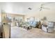 Comfortable living room with ample seating and natural light at 5603 80Th N St # 512, St Petersburg, FL 33709